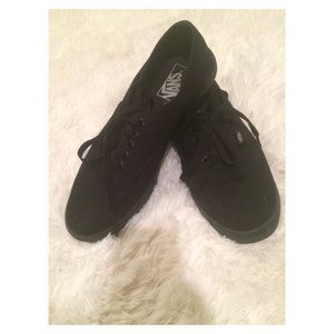 Vans black low top shoes